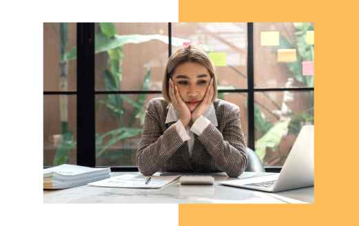 An organized desk setup with a laptop, papers, and a pen, symbolizing the process of lodging a tax return in Australia.